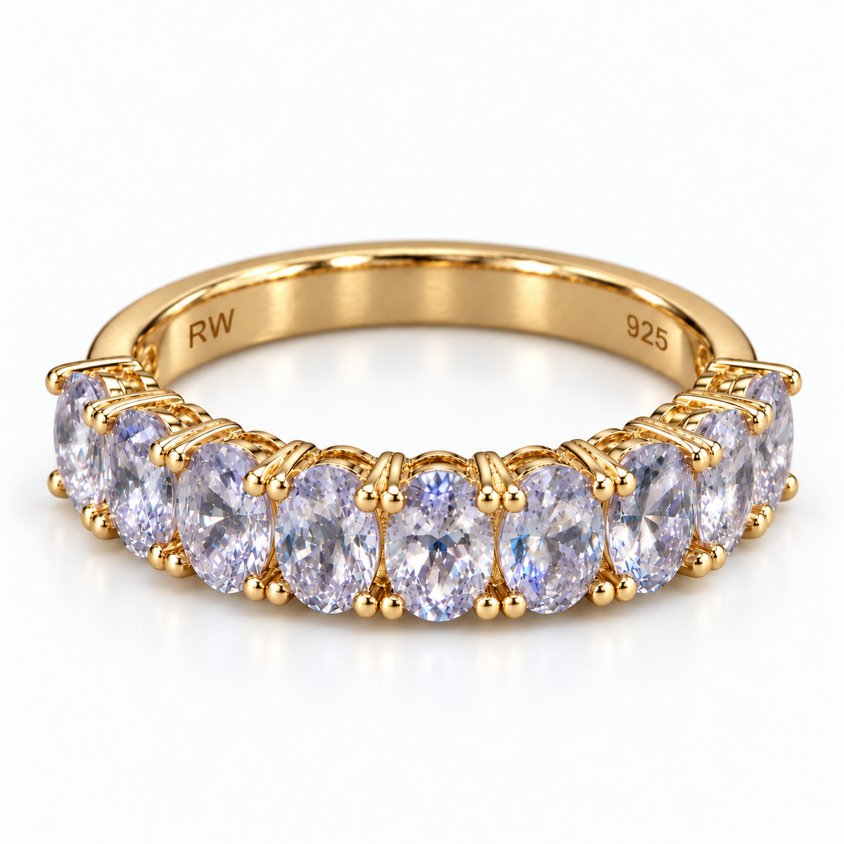 Tanzanite 1/2 eternity band in 18k gold over sterling silver