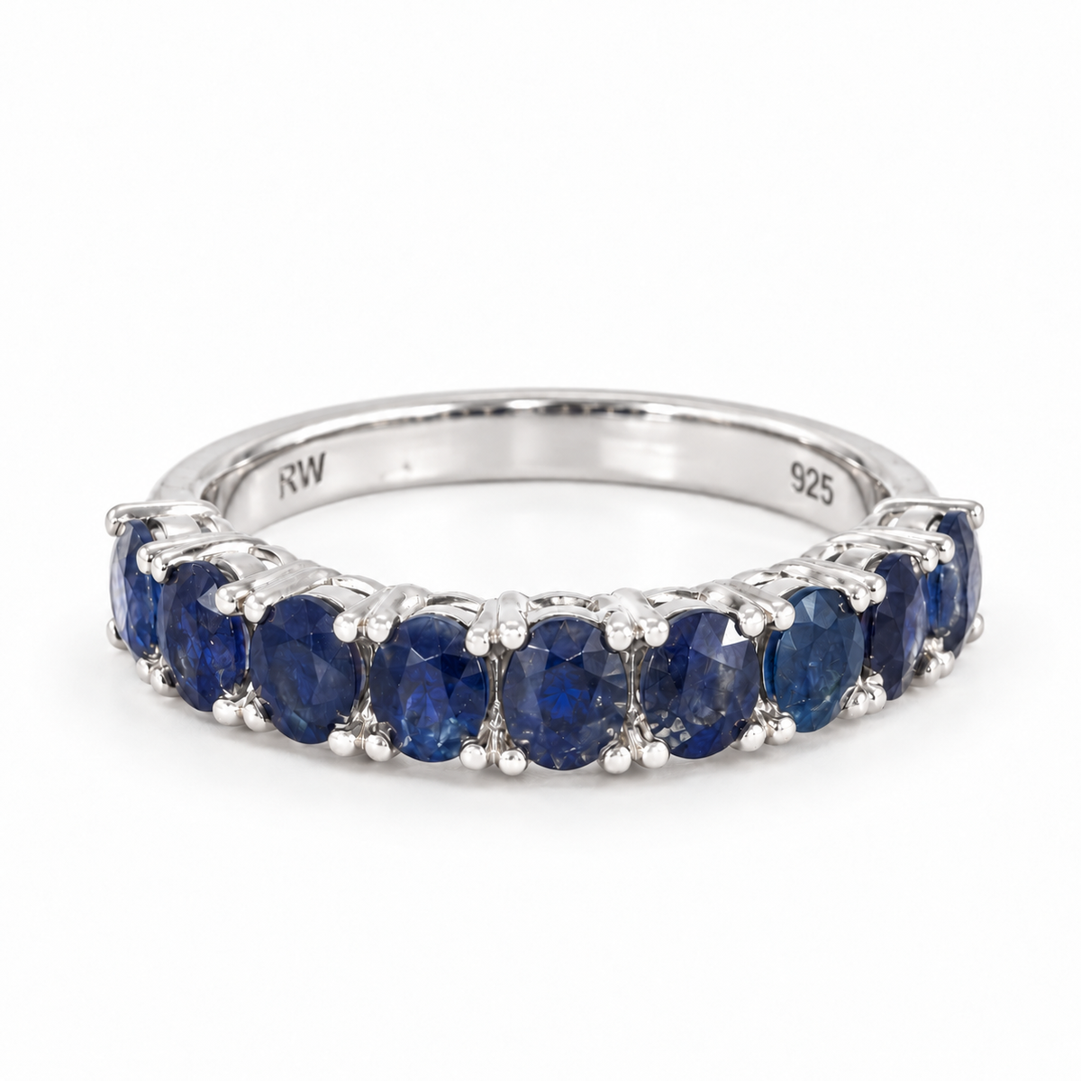Sapphire 1/2 eternity band in sterling silver